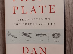 Cover of The Third Plate, with drawings of a carrot, flying goose, fish, and cut tomato and labels soil, land, sea, seed.